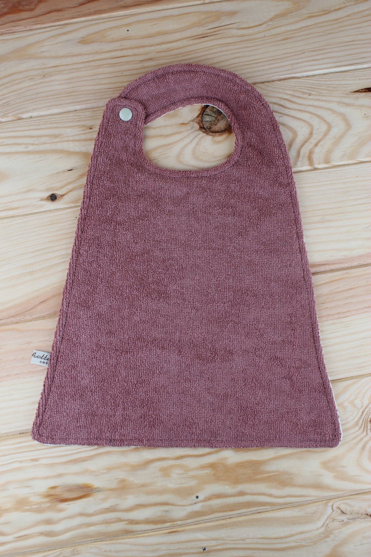 Bavoir taille 2