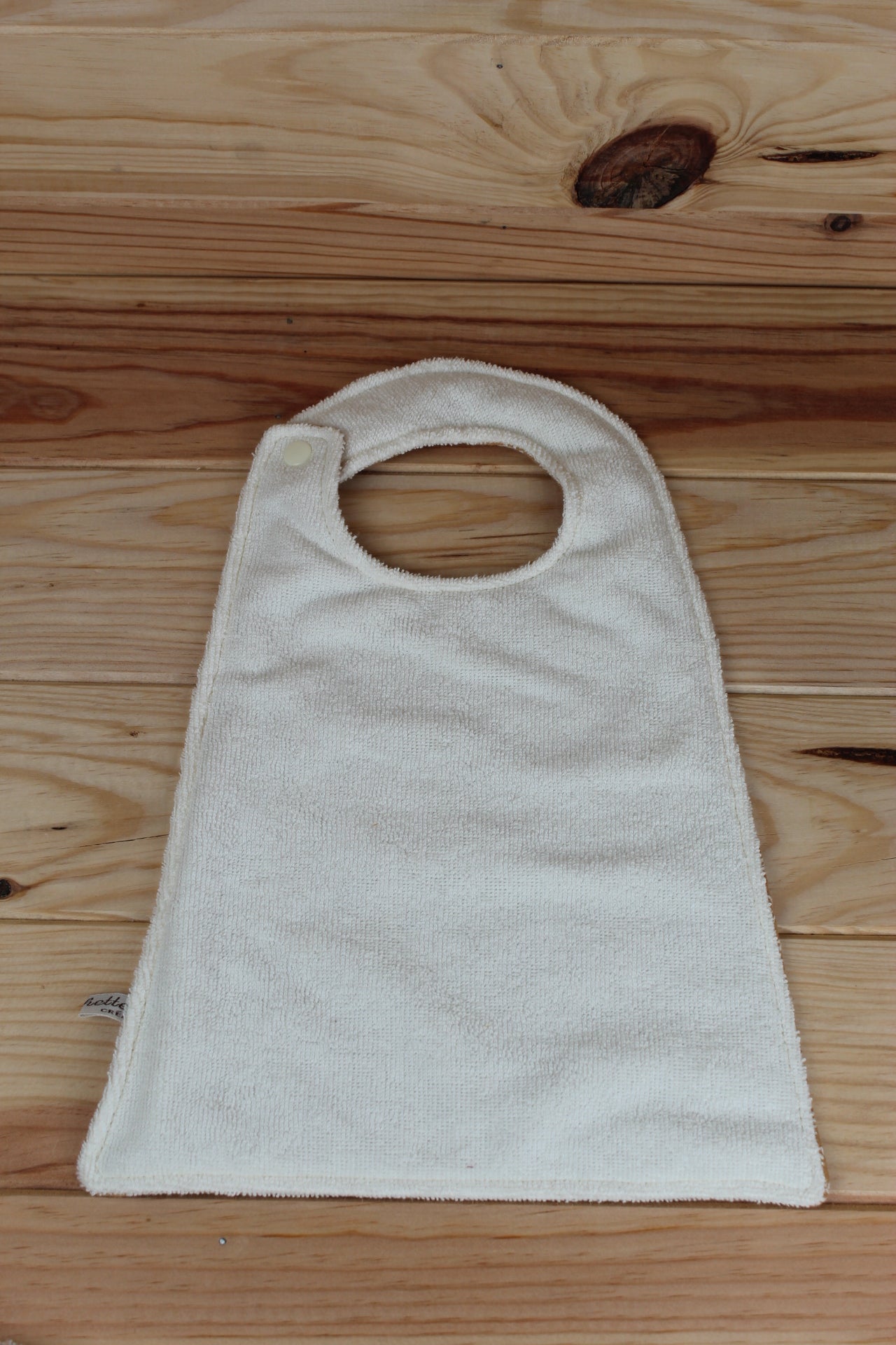 Bavoir taille 2