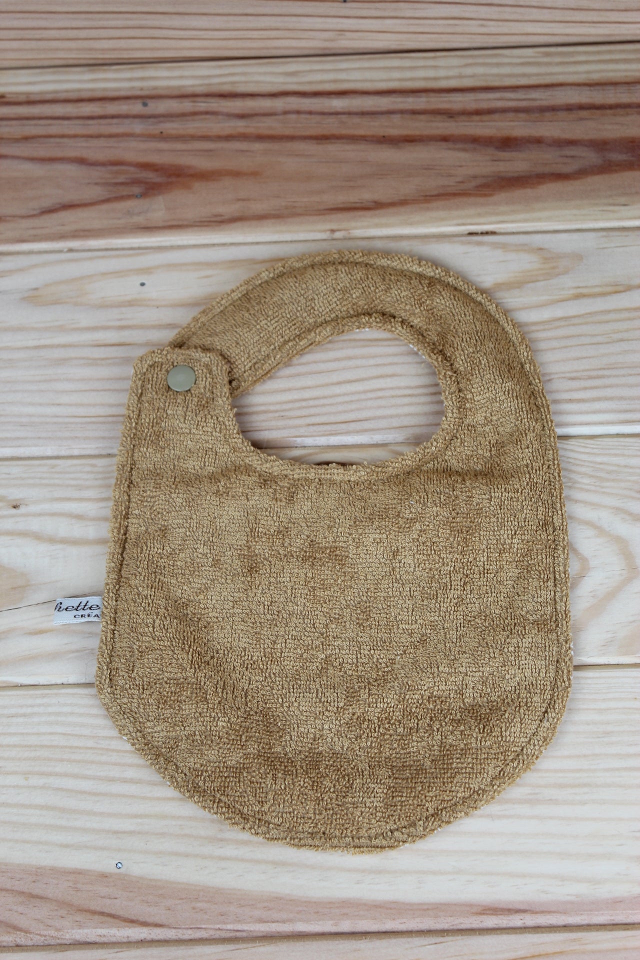 Bavoir taille 1